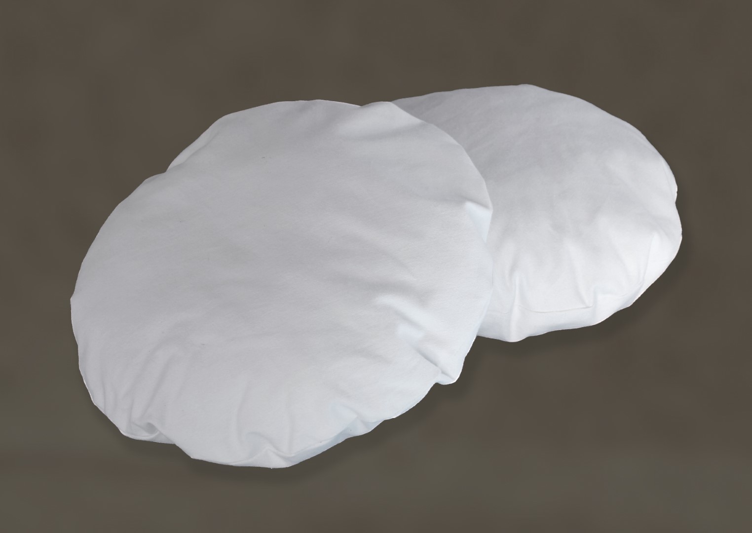 Rond kussentje van biologisch afbreekbaar katoen, gevuld met wol, voor gebruik bij opbaren en begraven